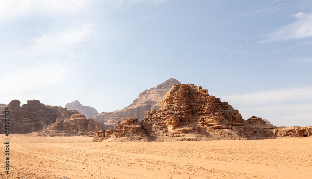 The indescribable magnificence of vast expanses of the endless sandy red desert of the Wadi Rum near Amman in Jordan The indescribable magnificence of vast expanses of the endless sandy red desert of the Wadi Rum near Amman in Jordan
