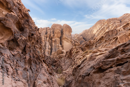 Breathtaking natural beauty of high mountains in red desert of the Wadi Rum near Amman in Jordan