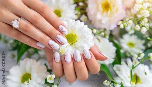 Nail Garden Delight: Woman's Hands Blossoming with Spring Flowers