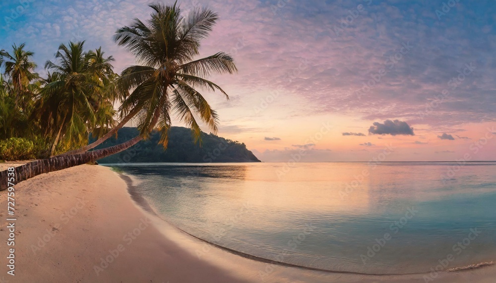 sunset on the beach, Paradise beach with palm trees and calm ocean at dawn or sunset. Panoramic banner of a peaceful landscape
