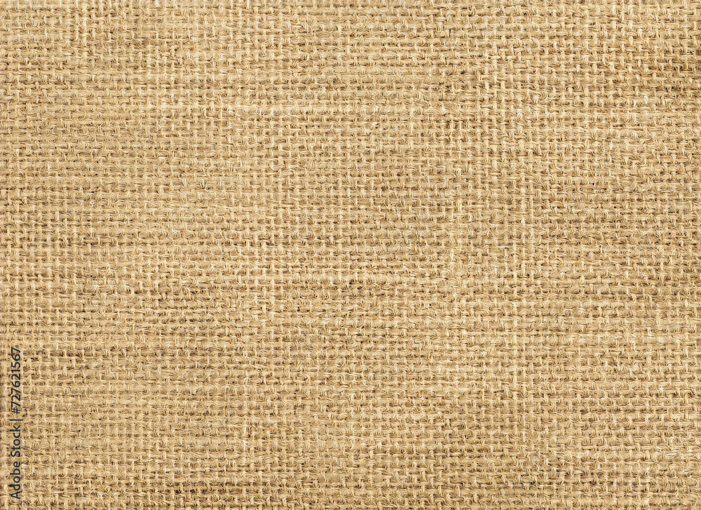Jute hessian sackcloth canvas sack cloth woven texture pattern background in yellow beige cream brown color Jute hessian sackcloth canvas sack cloth woven texture pattern background in yellow beige cream brown color