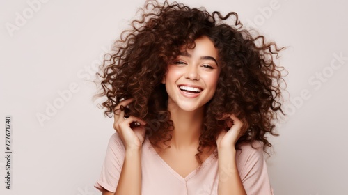 An Overwhelmed Individual with Voluminous Curly Hair Expressing happy smile