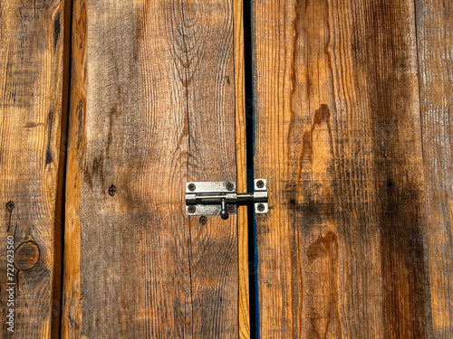 Wallpaper Mural Wooden barn door closed on metal latch Torontodigital.ca