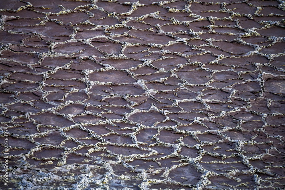 Textured Patterns of Evaporated Mineral Ponds in Rio Tinto Textured Patterns of Evaporated Mineral Ponds in Rio Tinto