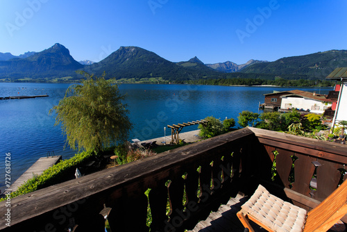 Fantastic view of a  lake and mountains through a terrace of a hotel room,Hallstatt,Austria