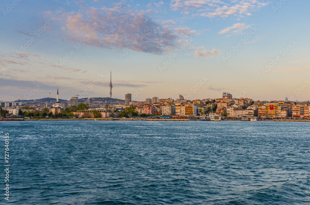 sunset view of Haydarpasa harbor and district from Bosporus (Istanbul, Turkey)  