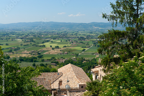 Landscape view over tiled roofs of village homes in Assissi