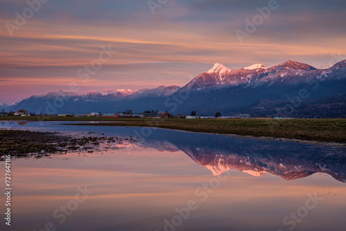 The snowy Mount Cheam sunset reflection in Chilliwack, BC, Canada