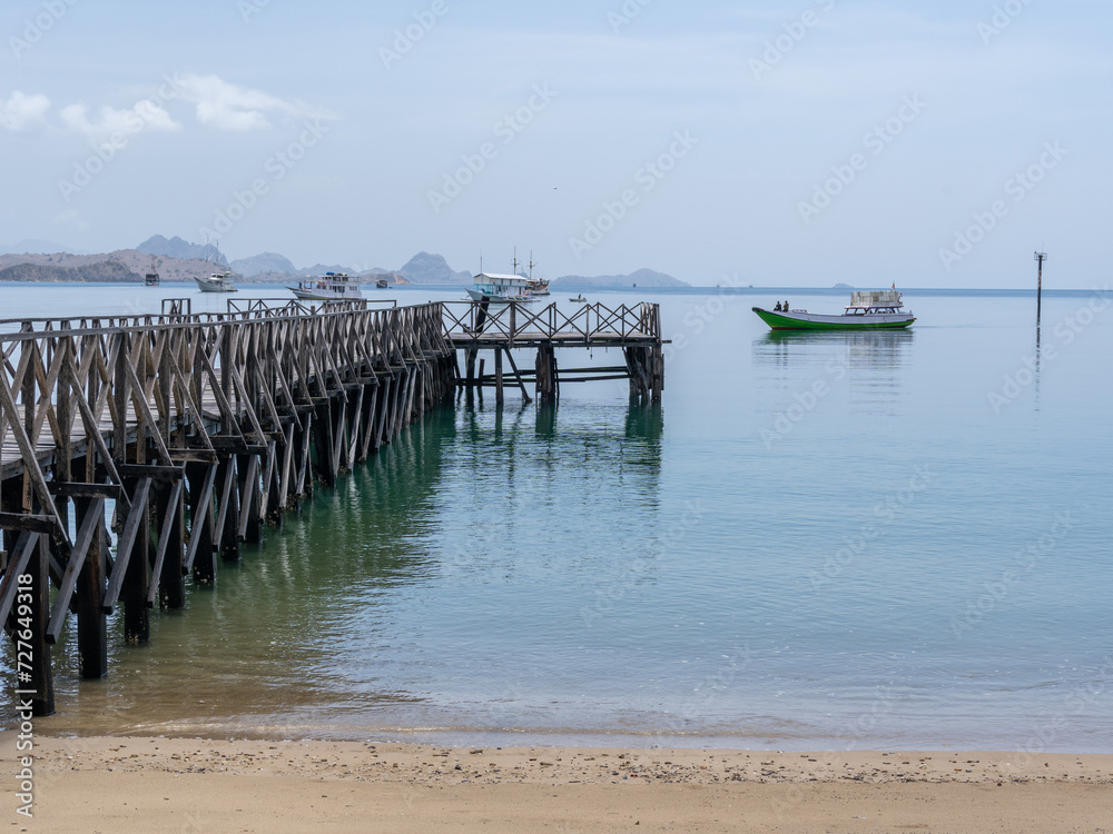 The Komodo Island wooden jetty prepares to welcome every visitor from around the world.