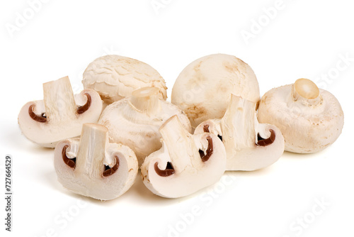 White champignons mushrooms, isolated on white background.