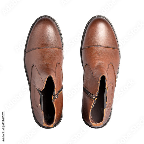 Men's, brown, leather boots. Top view. Isolated on a white background. Beauty and fashion.