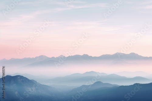 This photo showcases a mountain range shrouded in dense fog, creating a mysterious and atmospheric scene. © pham
