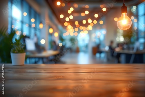 Blurred individuals in casual attire populate a lively business office space, complemented by a bokeh background for a modern and energetic feel.