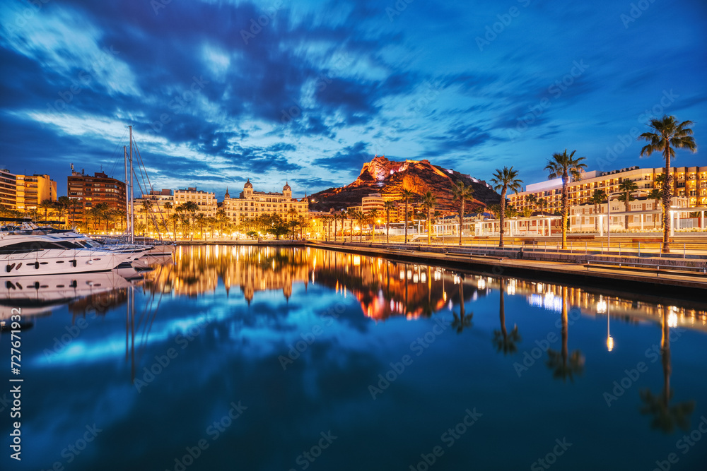Illuminated Alicante Old Town Panorama at Dusk with Santa Barbara Castle and Harbor