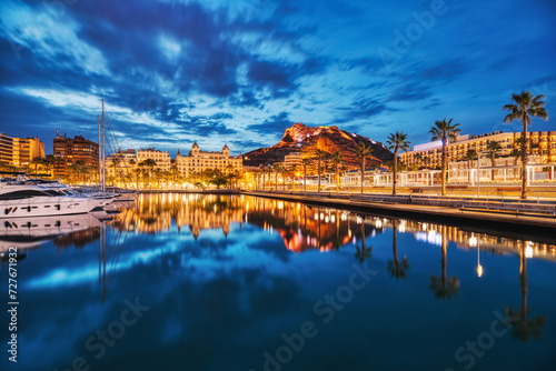 Illuminated Alicante Old Town Panorama at Dusk with Santa Barbara Castle and Harbor