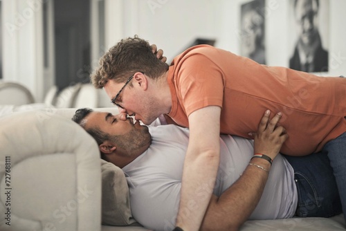 Portrait Young Homosexual Couple Kissing Sofa
