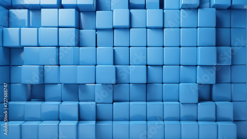 a blue wall with many square tiles