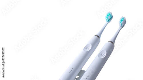 A premium electric toothbrush  with replaceable heads  on a white solid background. 