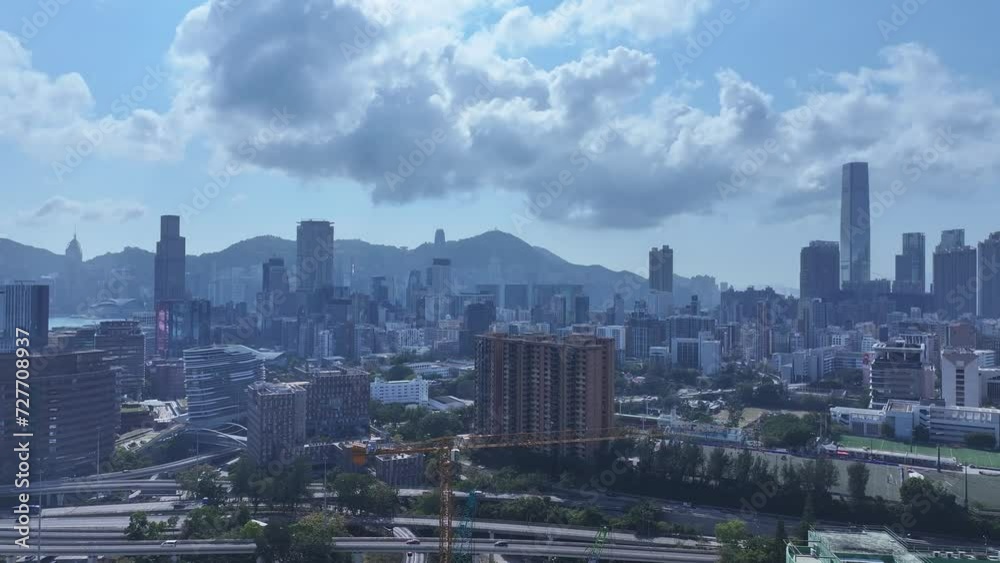 Aerial drone Skyview shot in Tsim Sha Tsui Whampoa Hung Hom commercial area, Hong Kong Victoria Harbour Financial Kowloon Peninsula and Central Wan Chai Causeway Bay Aerial drone Skyview shot in Tsim Sha Tsui Whampoa Hung Hom commercial area, Hong Kong Victoria Harbour Financial Kowloon Peninsula and Central Wan Chai Causeway Bay