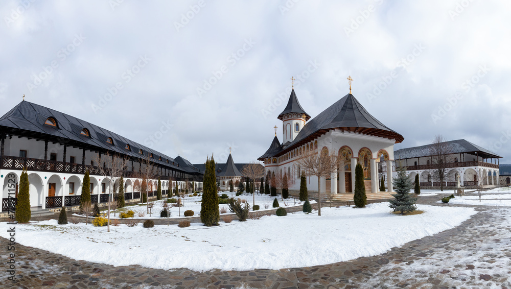 Fototapeta premium Nativity of the Mother of God monastery Marginea Suceava county - Romania in winter
