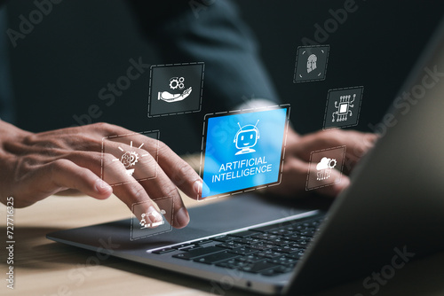 AI technology concept, Businessman use laptop with virtual artificial intelligence technology for big data network connection. science, innovation technology, cloud computing.