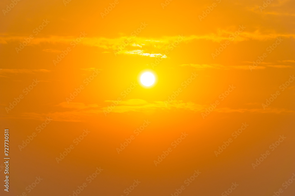 orange sky cloudless and bright yellow sun shining, nature landscape background.