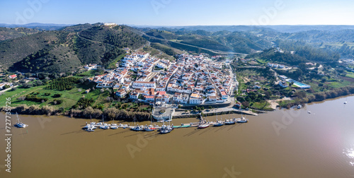 Aerial panoramic view of Sanlucar de Guadiana village in Huelva, Andalusia, on the banks of Guadiana river, in the border of spain with portugal, in front of the portuguese village Alcoutim in Algarve