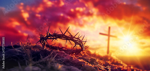 crown of thorns and cross at sunset, easter background photo