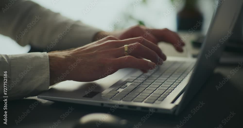 Businessman using laptop while working at office Businessman using laptop while working at office