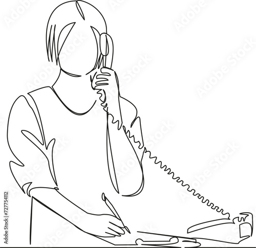 nurse talking on the phone and writing
