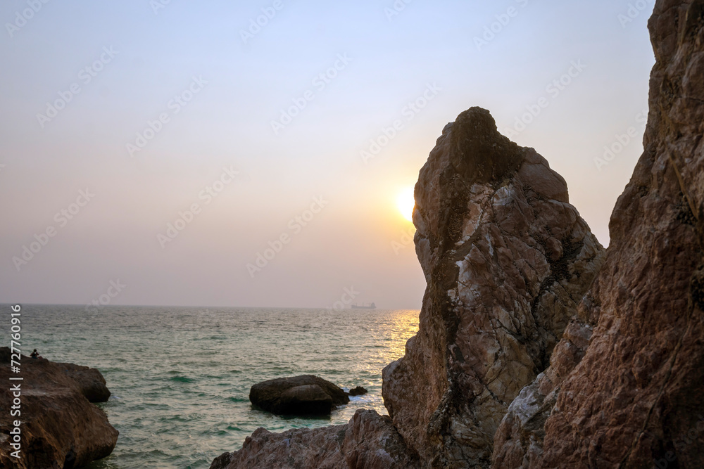 Breezy Morning Gadani Beach with rocks and mountain Balochistan Pakistan