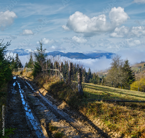 Foggy autumn mountain morning scene. Peaceful picturesque traveling, seasonal, nature and countryside beauty concept scene.