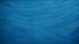 Blue paper parchment background with fibers.