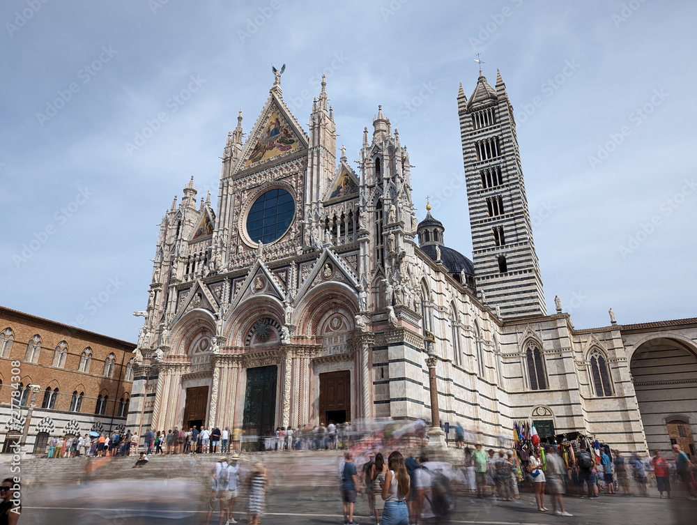 Fototapeta premium SIENA, ITALY - SEPTEMBER 23, 2023 - Portal of the famous cathedral of Siena