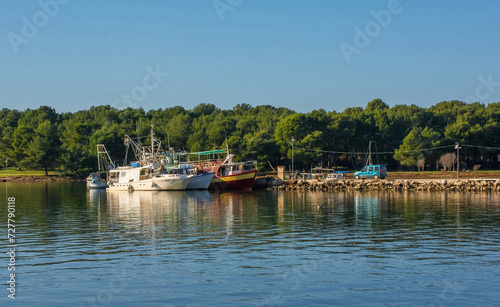 Fishing boats on the coast of Medulin in Istria, Croatia. December