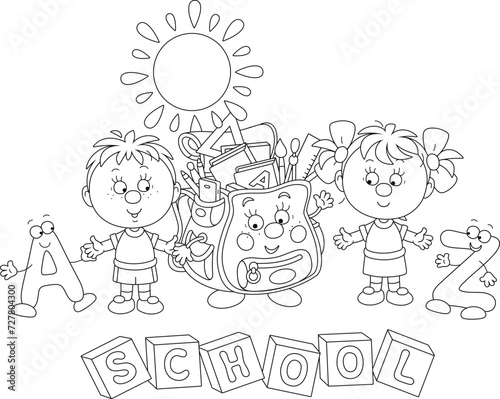 Happy little schoolboy and ...