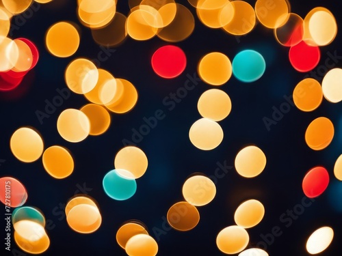 christmas bokeh lights over dark blue background, holiday illumination and decoration concept