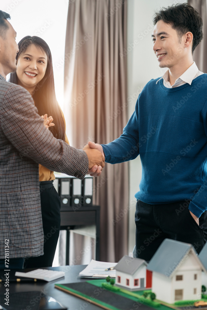 Close up two men shake hands at business meeting, office negotiations. Making deal sign, conclude contract, reach agreement, formal greeting, strike bargain. Successful negotiations. Close up two men shake hands at business meeting, office negotiations. Making deal sign, conclude contract, reach agreement, formal greeting, strike bargain. Successful negotiations.