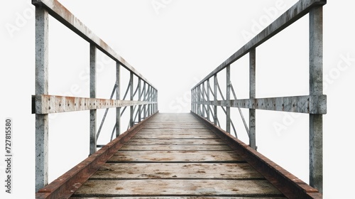 A wooden bridge with metal railings against a white sky. Perfect for architectural and outdoor themes