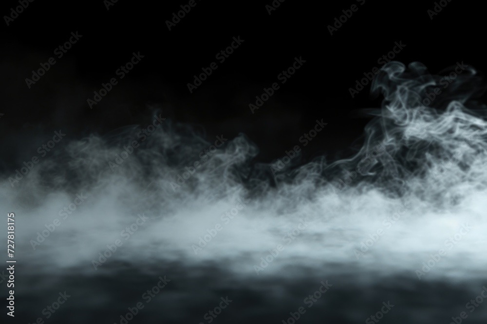 Smoke billowing out of a black background, creating a mysterious and dramatic atmosphere. Perfect for adding an intriguing touch to your designs