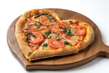Heart shaped Margherita Pizza on a wooden plate