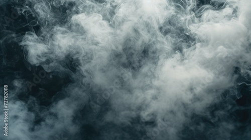 Close-up shot of smoke on a black background. Perfect for adding a mysterious or dramatic touch to any design or project