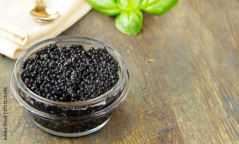delicious appetizer black caviar in a bowl delicious appetizer black caviar in a bowl