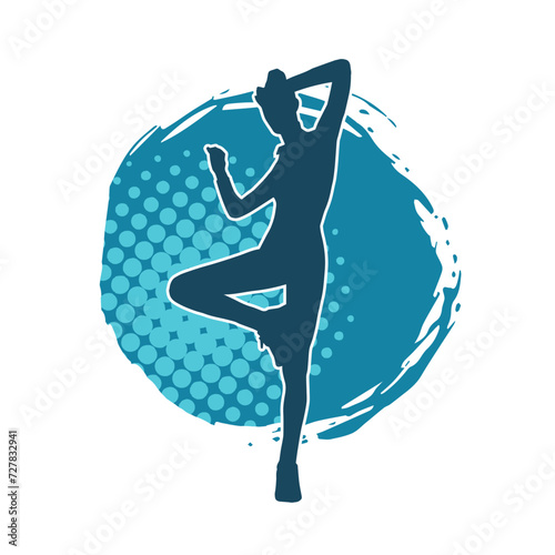 Silhouette of slim female doing exercise. Silhouette of a sporty woman doing gym workout pose. 