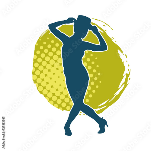 Silhouette of a female dancer in action pose. Silhouette of a woman dancing happily.