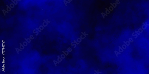 Blue powder explode cloud on black background.grunge blue background texture.Launched blue dust particle splash.Freeze motion of blue powder splash.