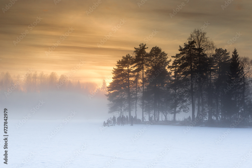 Sunset over frozen Sognsvann lake in Oslo Sunset over frozen Sognsvann lake in Oslo