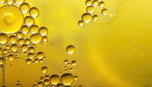 Abstract yellow background with water bubbles from oil and fat solvent
