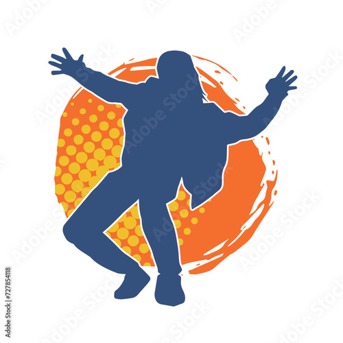 Silhouette of a slim man dancing pose. Silhouette of a male dancer in action pose.