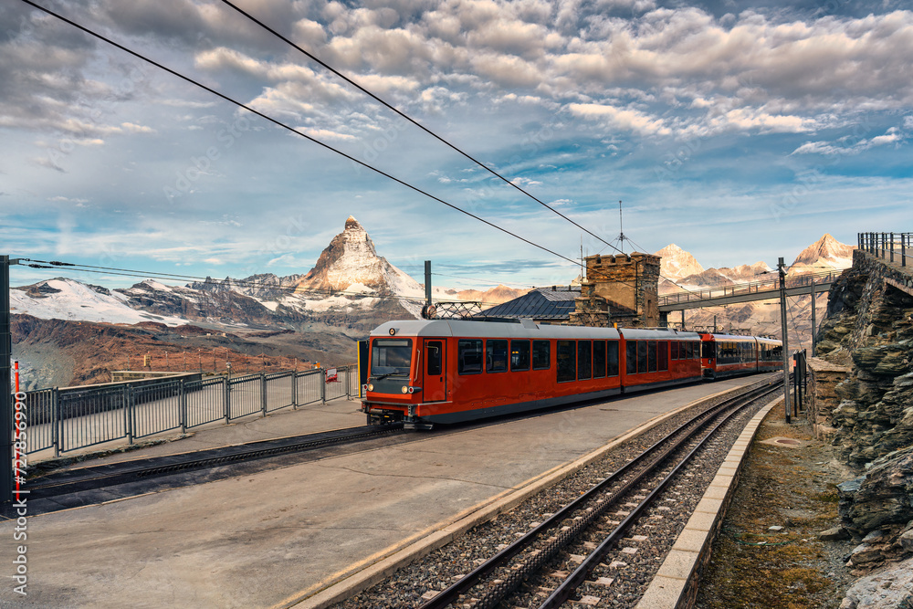 The electric train with Matterhorn mountain on summit at Gornergrat station